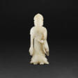 A SMALL WHITE JADE FIGURE OF BUDDHA - Auktionspreise