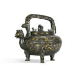 AN ARCHAISTIC SILVER AND GOLD WIRE INLAID BRONZE POURING VESSEL, HE - photo 1