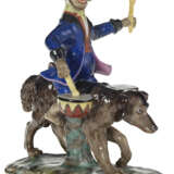 A Porcelain Figurine of a Monkey-Band Drummer - фото 1