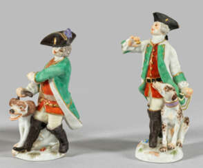 Zwei Miniaturfiguren "Jäger mit Hunden"