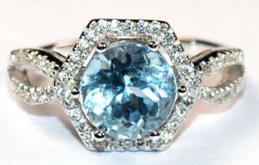 Ring, 925er Silber, rhodiniert, Blautopas und Zirkonia im Brillantschliff, RG 53 Innendurchmesser 16,8 mm, Größe des Steines ca. 0,8 cm