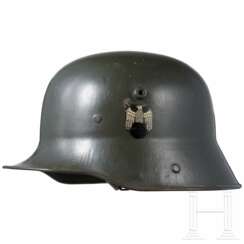 Stahlhelm M16 mit Tarnüberzug