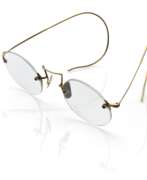 Aperçu. Brille mit Goldgestell