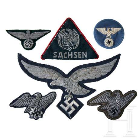 A Small Collection of Eagle Insignia - photo 1