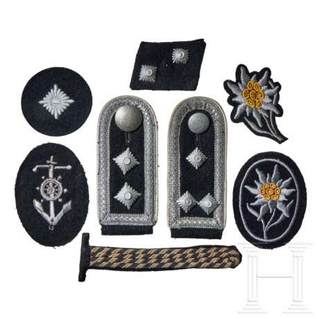 A Small Collection of SS Insignia - photo 1