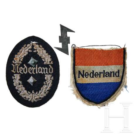 A Small Collection of Nederland Volunteer Insignia - photo 1