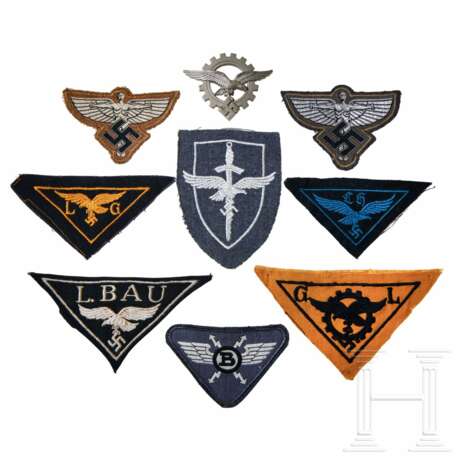 A Small Collection of Eagle Insignia - фото 1