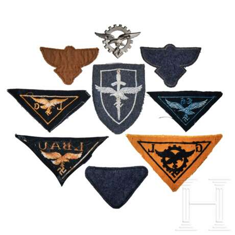 A Small Collection of Eagle Insignia - фото 2