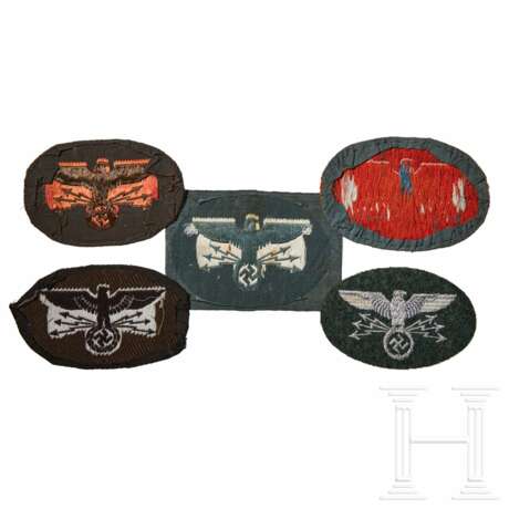 A Small Collection of Postschutz Insignia - фото 2