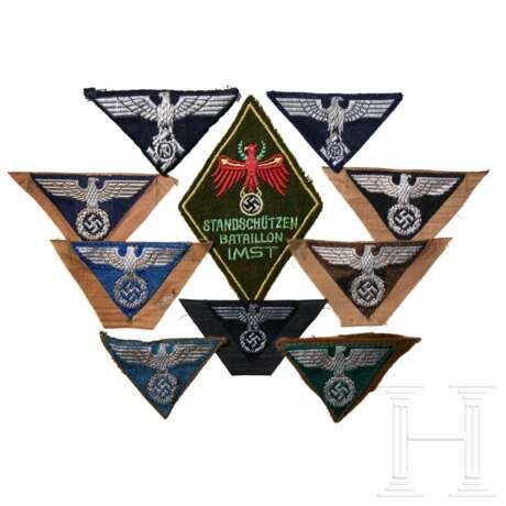 A Large Collection of Eagle Insignia - photo 1