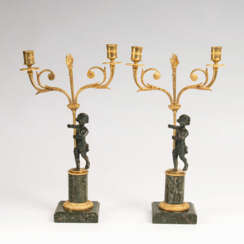  "Pair of small Empire candelabra with a Putto"