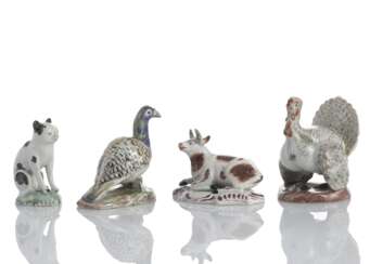 Vier Miniatur-Tierfiguren