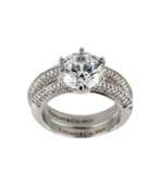 Silber 925. Bague double en argent avec zircons tailles en brillant. 