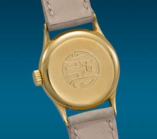 PATEK PHILIPPE. AN ATTRACTIVE 18K GOLD WRISTWATCH WITH TWO-TONE SECTOR DIAL - Foto 3