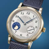 A. LANGE & S&#214;HNE. A RARE AND ELEGANT 18K HONEY GOLD LIMITED EDITION WRISTWATCH WITH MOON PHASES, MADE TO COMMEMORATE THE 165TH ANNIVERSARY OF A. LANGE & S&#214;HNE IN 2010 - photo 2