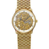 AUDEMARS PIGUET. A RARE AND ATTRACTIVE 18K GOLD AUTOMATIC SKELETONIZED WRISTWATCH WITH BRACELET - фото 1