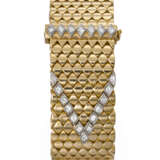 CARTIER. A VERY RARE, UNUSUAL AND ELEGANT 18K GOLD AND DIAMOND-SET BRACELET WATCH WITH CONCEALED DIAL AND BACK WINDING - фото 1