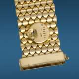 CARTIER. A VERY RARE, UNUSUAL AND ELEGANT 18K GOLD AND DIAMOND-SET BRACELET WATCH WITH CONCEALED DIAL AND BACK WINDING - фото 4
