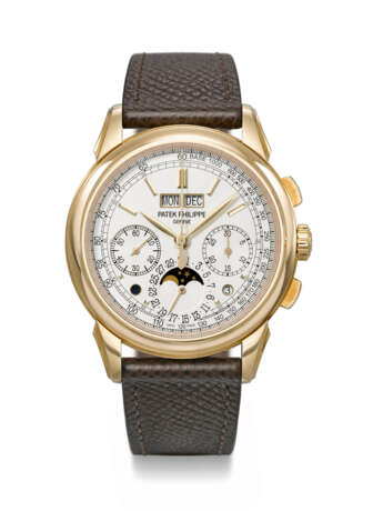 PATEK PHILIPPE. AN ELEGANT AND COVETED 18K GOLD PERPETUAL CALENDAR CHRONOGRAPH WRISTWATCH WITH MOON PHASES, LEAP YEAR, AND DAY/NIGHT INDICATION - photo 1