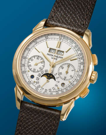 PATEK PHILIPPE. AN ELEGANT AND COVETED 18K GOLD PERPETUAL CALENDAR CHRONOGRAPH WRISTWATCH WITH MOON PHASES, LEAP YEAR, AND DAY/NIGHT INDICATION - photo 2