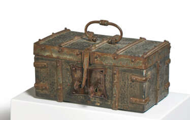 WOODEN CASKET WITH ORNAMENTALLY EMBOSSED LEATHER COVERING