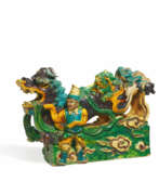 Страны и континенты. CERAMICS FIGURINE OF A RIDGE TURRET WITH MYTHICAL CREATURE AND STANDING MAN