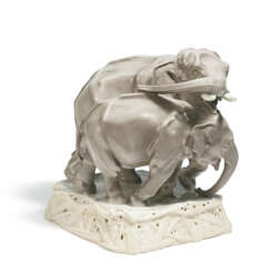 LARGE GROUP WITH TWO PORCELAIN ELEPHANTS ON BAMBOO PEDESTAL