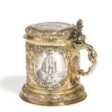 LARGE SILVER LIDDED TANKARD WITH FINELY ENGRAVED COSTUME FIGURES AND ALLIANCE COAT OF ARMS - photo 1