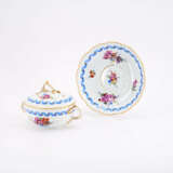 PORCELAIN ÉCUELLE & SAUCER WITH BLUE BOW AND 'GERMAN' FLOWERS - photo 1