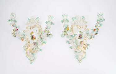 PAIR OF PORCELAIN APPLIQUES WITH CUPIDS