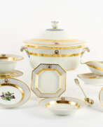 KPM - Royal Porcelain Manufactory Berlin. PORCELAIN DINNER SERVICE WITH COAT OF ARMS DECOR