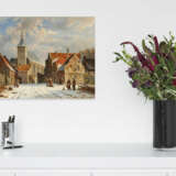 Wintery Snow-Covered Street in a Dutch Town - photo 4