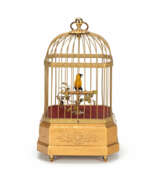 Verschiedene Antiquitäten. Singvogelautomat