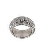 Overview. White metal ring with rhinestones made according to the Piaget model. 