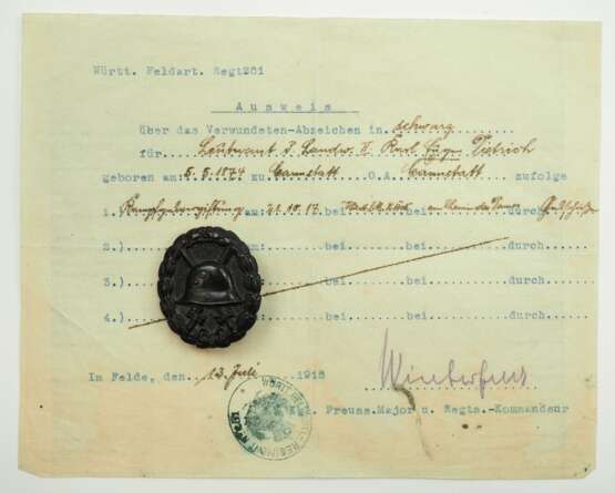 Deutsches Reich: Verwundetenabzeichen, 1918, der Armee, Schwarz, mit Urkunde für einen Leutnant d. Landwehr II. im Württ. Feldart. Regt. 281. - photo 1