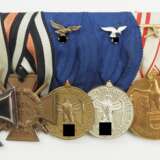 Große Ordenschnalle eines Luftwaffe Soldaten mit 6 Auszeichnungen. - photo 1