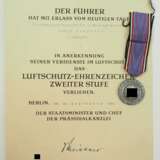 Luftschutz-Ehrenzeichen, 2. Stufe, mit Urkunde für einen Ortsrgruppen-Baubearbeiter im Reichsluftschutzbund in Ennigloh. - фото 1