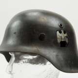 Wehrmacht: Stahlhelm M42 - 1 Emblem. - фото 1