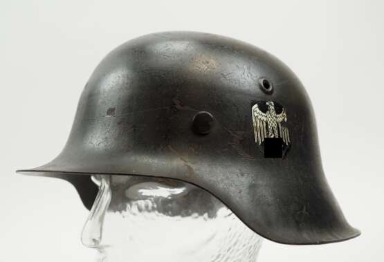 Wehrmacht: Stahlhelm M42 - 1 Emblem. - фото 1