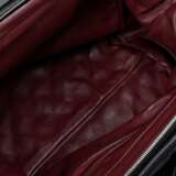 Chanel Tasche "Cocoon", schwarzes gestepptes Nappaleder, silberfarbene Hardware, Zwei-Wege-Reißverschluss, Reißverschlusstasche außen mit geprägtem "CC" Logo, innen bordeauxfarbenes Leder und Reißvers… - photo 5