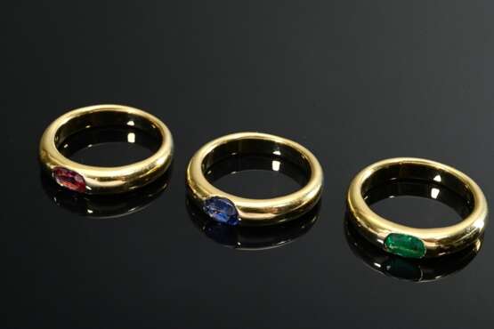 3 Klassische Gelbgold 750 Bandringe mit oval facettiertem Rubin, Saphir und Smaragd, zus. 20g, Gr. 52,5 - photo 2