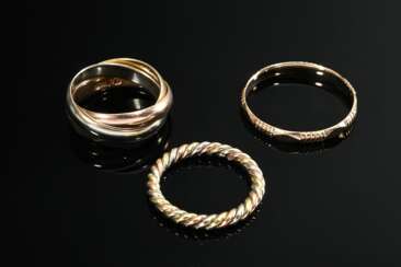 3 Diverse Ringe: Rotgold 585 mit geometrischen Mustern (1,7g, Gr. 61), Tricolor Gold 585 (5,8g, Gr. 46) und gewickelter Tricolor Gold 585 (2,7, Gr. 48)