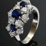 Gelb- und Weißgold 750 Trilogie Ring mit Saphiren (zus. ca. 0.70ct) und Brillanten (zus. ca. 1.10ct/VSI/W), 6,2g, Gr. 55 - photo 1