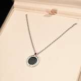 Bulgari Silber 925 "Save the children" Anhänger mit Onyxplatte und kleinem Rubin (ca. 0.07ct) an Kette, mit Box und Authenticity Card, 7,2g, verstellbare L. 38,5-42,5cm - photo 4