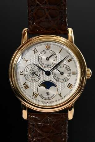 Etienne Schwarz Roségold 750 "Calendar" Automatik Armbanduhr, weißes guillochiertes Zifferblatt mit römischen Zahlen, original braunes Krokolederarmband mit vergoldeter Dornschließe, 72g, Ø 3,8cm, L. 18cm, Orig… - photo 1