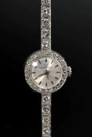 Eterna-Matic Weißgold 750 Damenarmbanduhr mit Achtkantdiamant Lünette und Brillantband (zus. ca. 2.65ct/VSI-SI/W), Handaufzug, 25,1g, L. 19cm, nicht gangbar (keine Garantie auf Werk und Funktionalität); Aufzugswelle verb… - photo 3