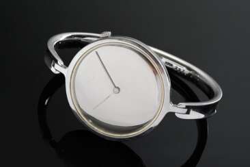 Georg Jensen Stahl Spangenarmbanduhr „Torun“, Entw.: Vivianna Torun Bülow-Hübe, Handaufzug, Spiegelzifferblatt, verso Monogramm Gravur &quot;HG&quot;, punziert und sign., Kopenhagen, um 1975, 35g, Ø 3,2cm, mit Box, gangb…