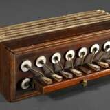 Kinder Ziehharmonika mit Holzeinlagen sowie Perlmutt- Messinghebeln, Blasebalk mit bedrucktem Papier beklebt um 1900, 9,6x23,5x8,8cm, bespielt, 1 Perlmutttaste fehlt - фото 1