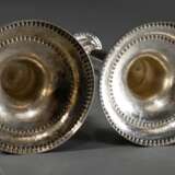 Paar Königsberger Leuchter in klassizistischer Façon mit Perlfriesen und Akanthusblatt Manschetten, um 1810, MZ: Johann Jacob Öhrmann II (1780-1829), Silber, 982g, am Fuß punktiertes Besitzermonogramm "C.F.v.E.&quot… - фото 5