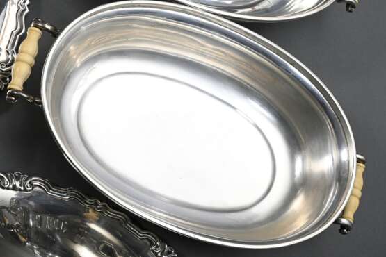 Paar oval bombierte dänische Silber Terrinen mit ornamentalem Rand sowie Elfenbein Griffen und Knauf, MZ: A. Dragstedt, Kopenhagen 1940, Silber 830, 3130g, 15x32x20cm, Genehmigung nach VO (EG) 338/97 liegt vor (kein Expo… - photo 5